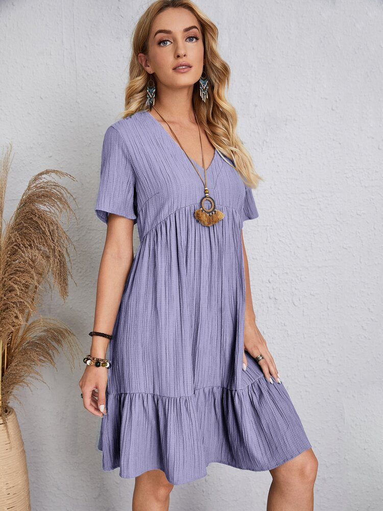 Casual flowy dress with a waist knot