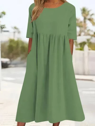 Cotton dress with round collar and pockets